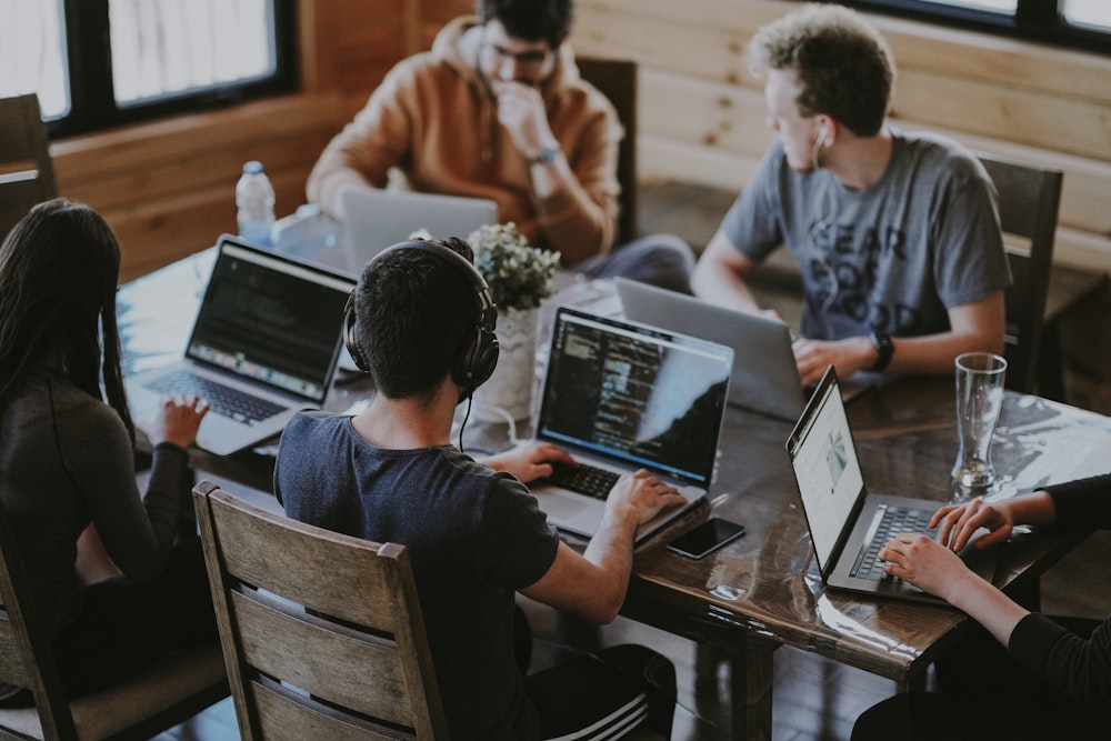 The NovaPayworks consulting team collaborating in their office